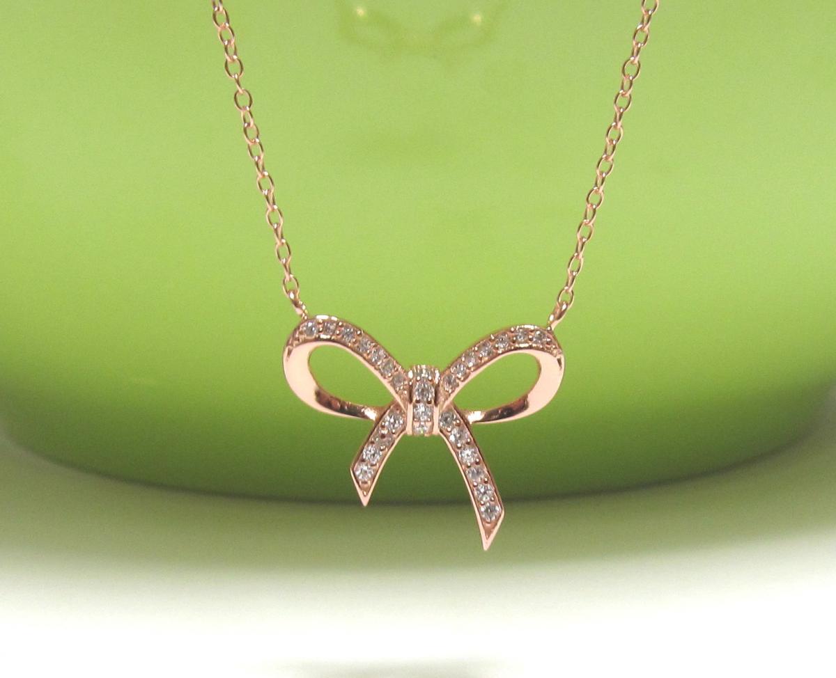 Adorable Infinity Bow Necklace In Rose Gold Over Sterling Silver