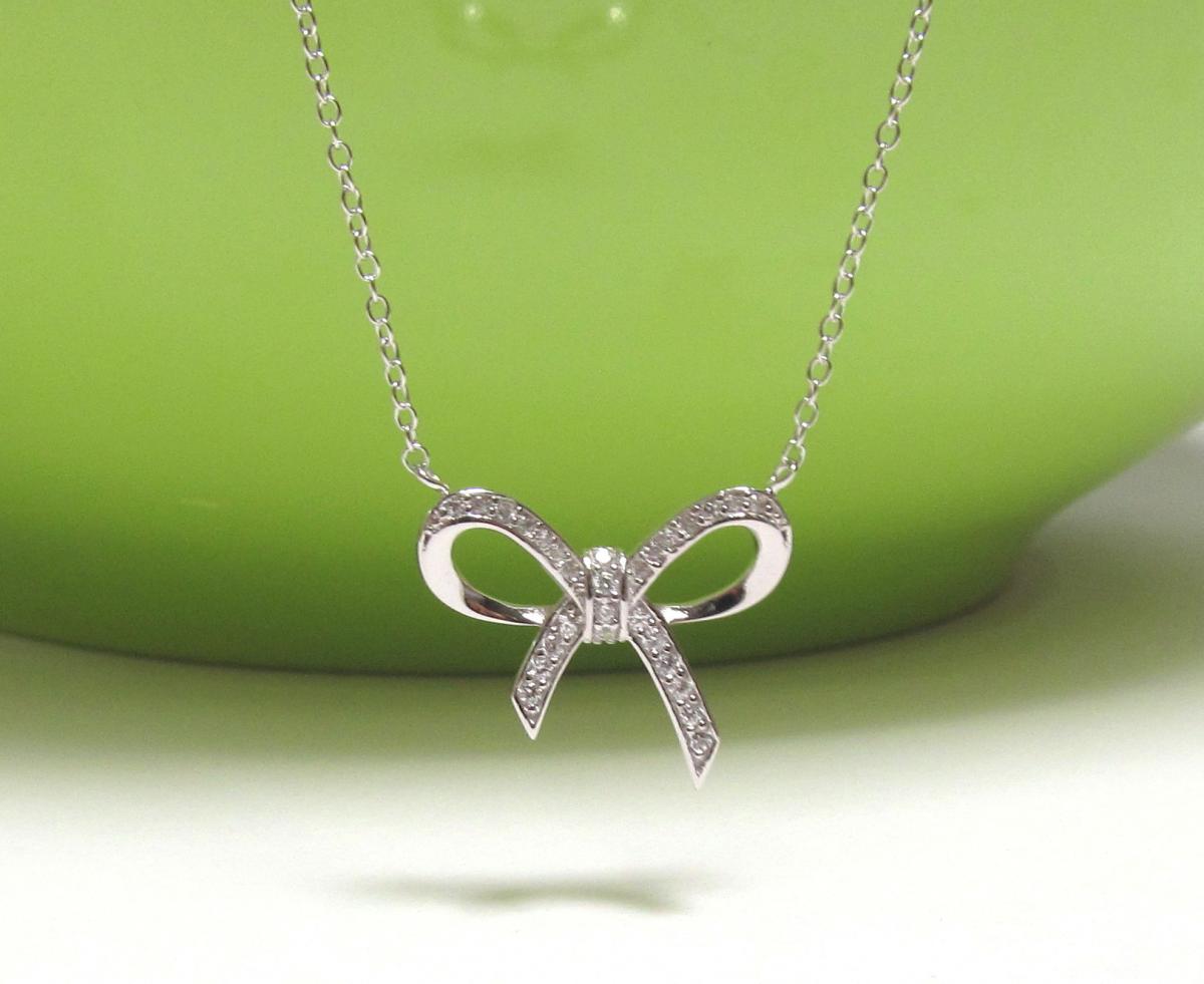 Adorable Infinity Bow Necklace In Rhodium Over Sterling